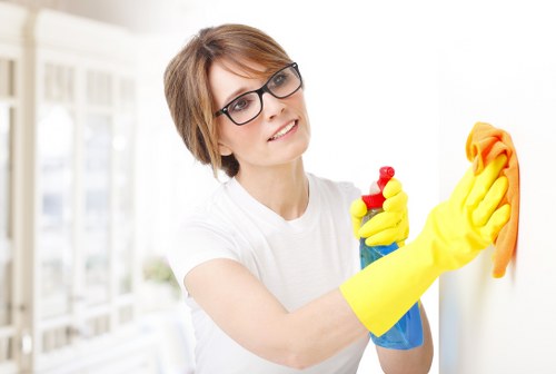 Cleaner preparing a tidy and well-kept SW16 interior